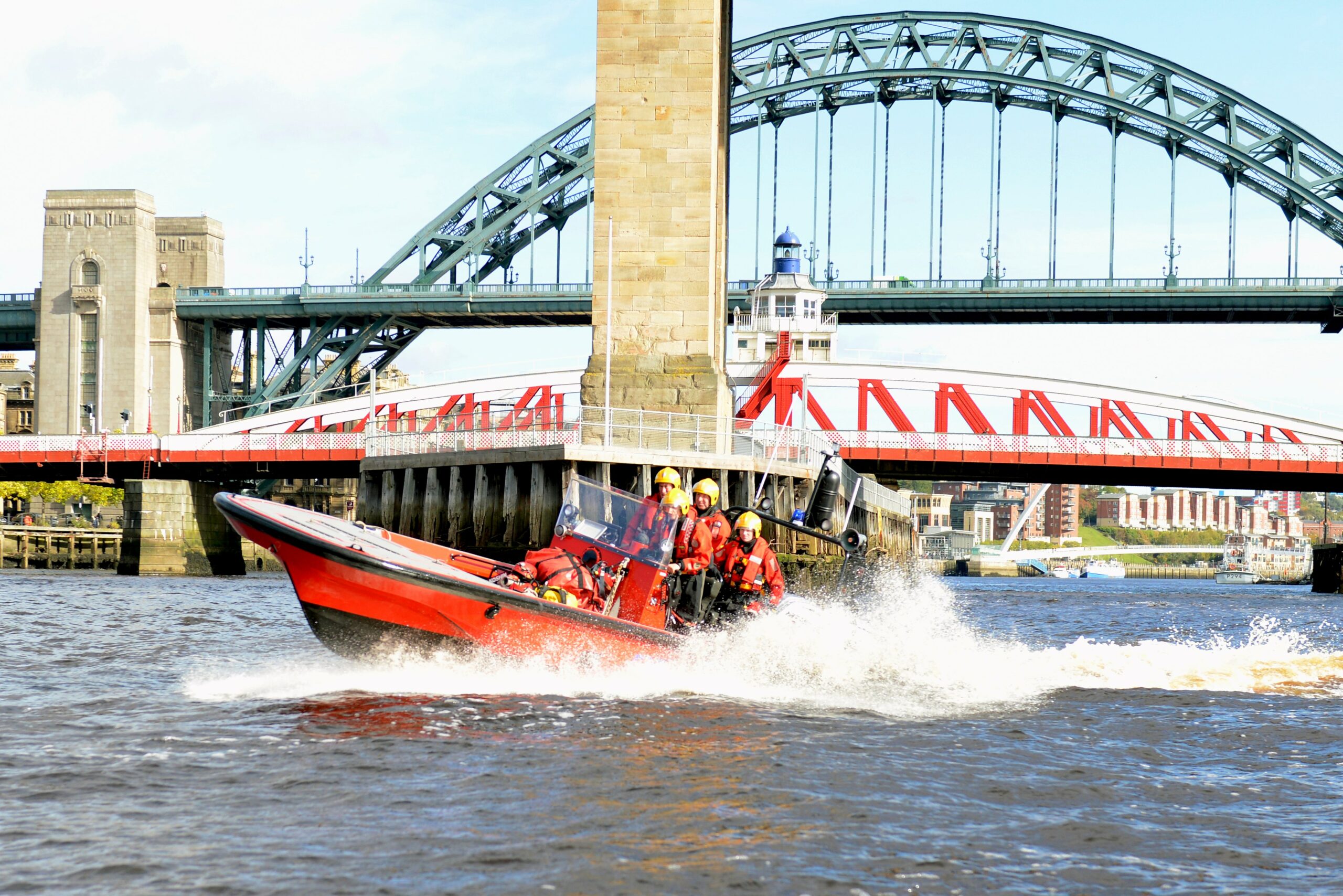 Photograph of a fire boat on the river