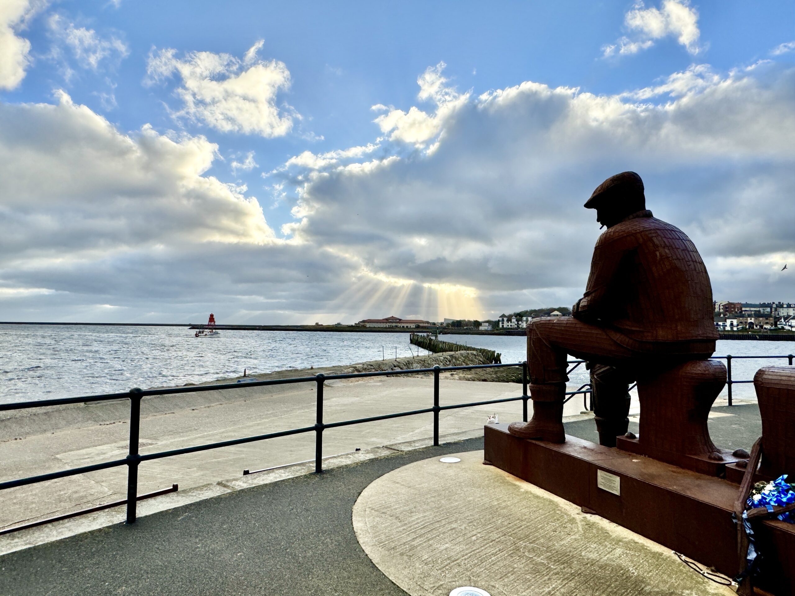 Photograph of a statue looking out to sea in North Tyneside