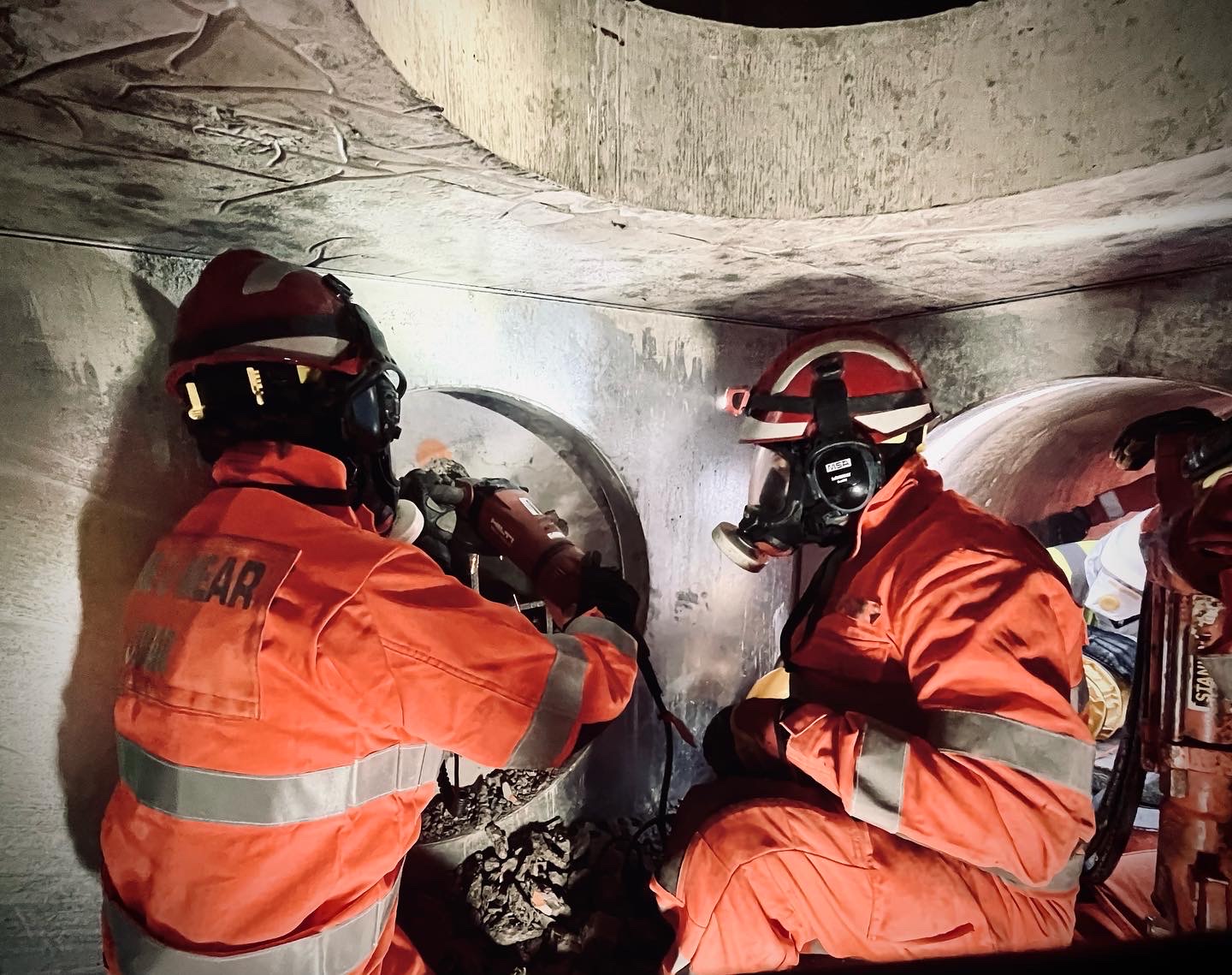 Photograph showing an Urban Search and Rescue team at work