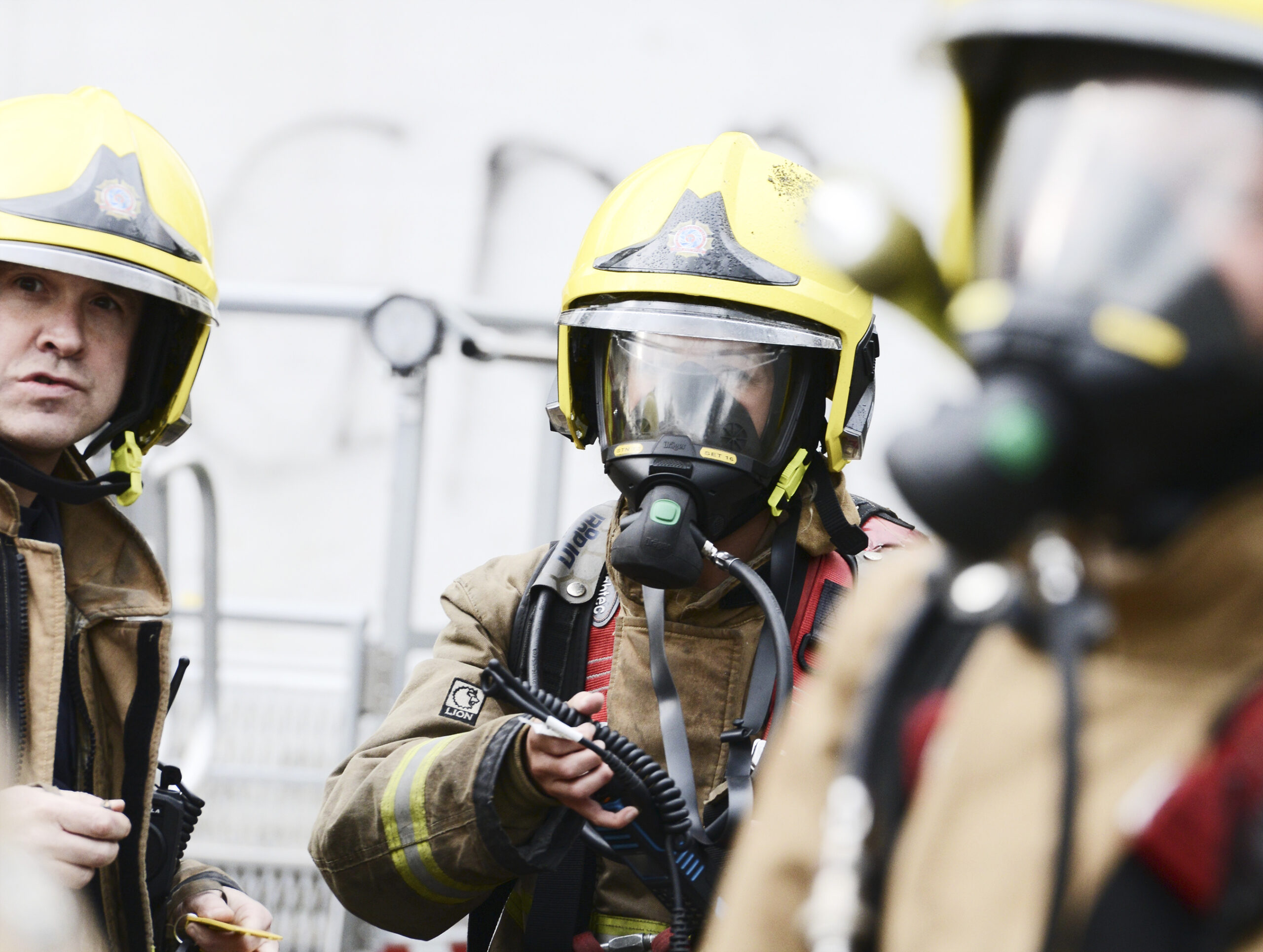 Photograph of firefighters wearing breathing equipment