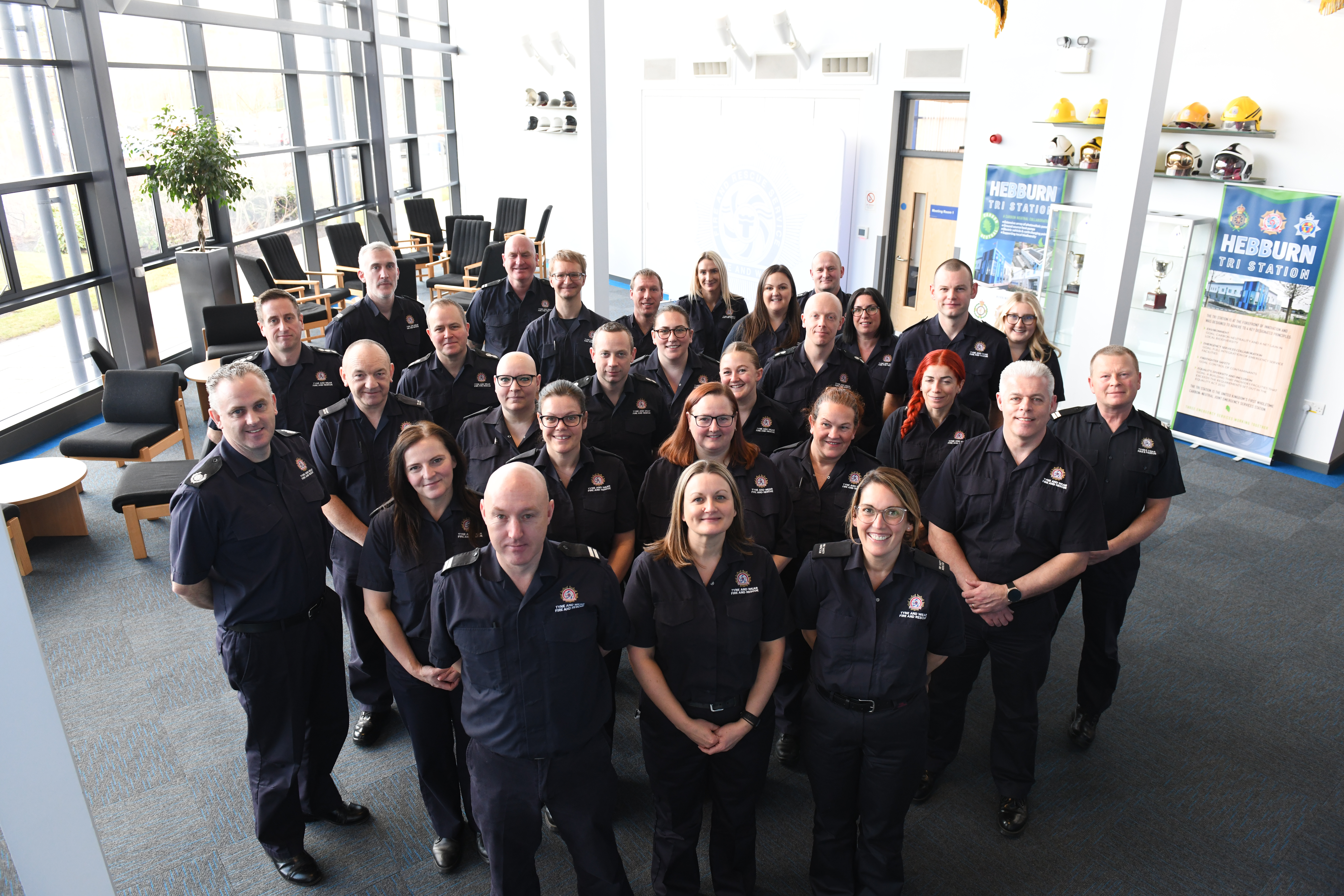 Photograph of tyne and wear fire and rescue service staff smiling