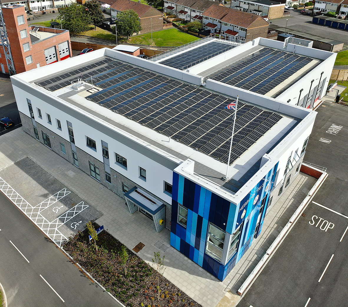 photograph of solar panels on a fire station roof