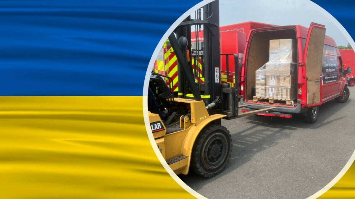 Photograph of boxes being loaded into a van, overlayed with the flag of Ukraine