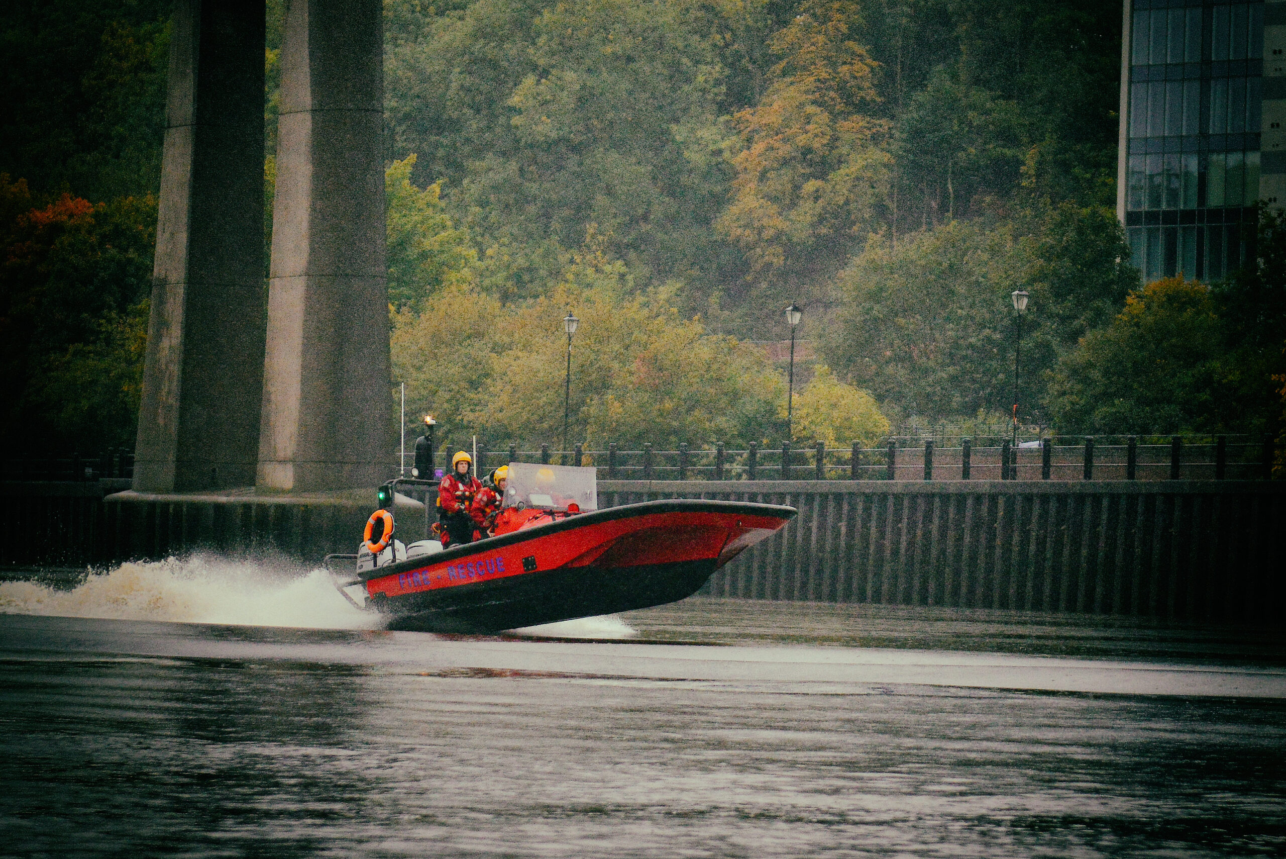 Fire boat on the river tyne with firefighters