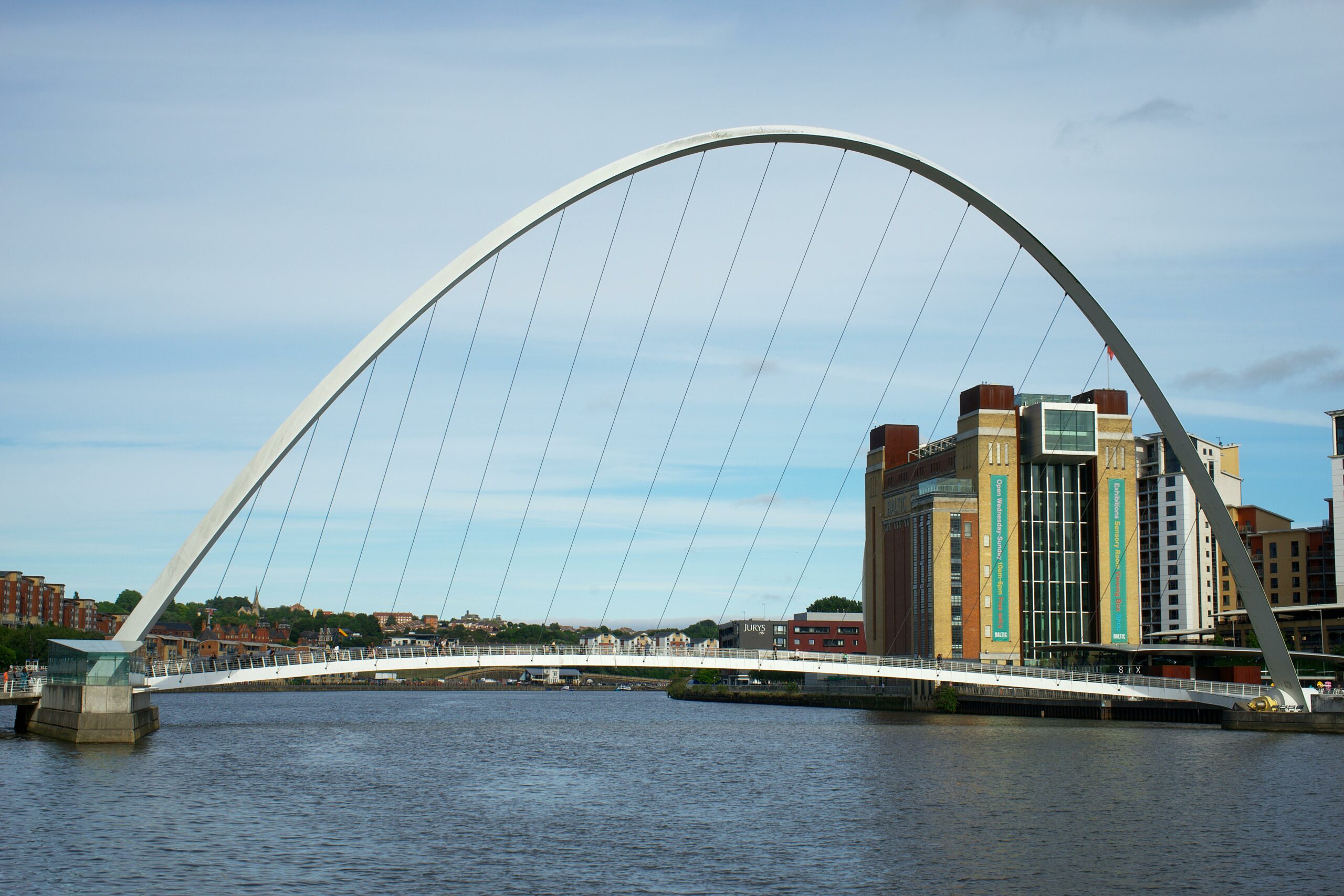 Photograph of Gateshead Millennium Bridge and the Baltic building on the River Tyne.